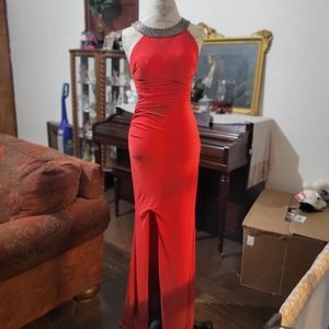 Stunning red prom formal with beaded collar.